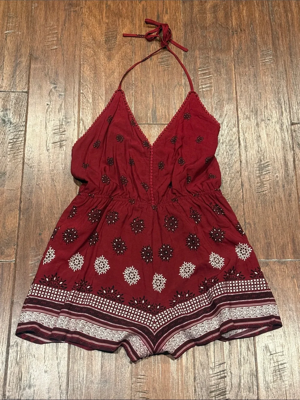 Size Medium Women’s Burgundy Printed Romper with V-Neck